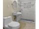 Elegant bathroom featuring a pedestal sink and a sleek, glass-enclosed marble shower at 2480 Avenue E Sw, Winter Haven, FL 33880