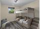 Comfortable bedroom with bunk beds and modern minimalist design at 2480 Avenue E Sw, Winter Haven, FL 33880