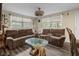 Cozy living room with comfortable seating, unique table, and lots of natural light at 2480 Avenue E Sw, Winter Haven, FL 33880