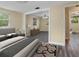 Comfortable main bedroom connecting to extra space and a soothing color palette at 2480 Avenue E Sw, Winter Haven, FL 33880