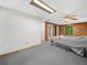 Large bedroom featuring carpet, log walls and ceiling fan at 2530 Arbuckle Shores Rd, Frostproof, FL 33843