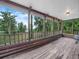 Spacious deck overlooking a beautiful lake and mature trees at 2530 Arbuckle Shores Rd, Frostproof, FL 33843