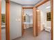 Hallway with doorway views of bedroom and bathroom at 2530 Arbuckle Shores Rd, Frostproof, FL 33843