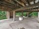 Home undercarriage showing the support beams at 2530 Arbuckle Shores Rd, Frostproof, FL 33843