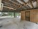 The undercarriage of the home showing support beams at 2530 Arbuckle Shores Rd, Frostproof, FL 33843