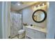 Updated bathroom featuring a shower/tub combo and a modern vanity at 2835 Wingfoot Ct, Winter Haven, FL 33884