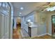 Modern kitchen features stainless steel appliances, white cabinets, and hardwood flooring at 2835 Wingfoot Ct, Winter Haven, FL 33884