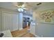 Spacious kitchen with stainless steel appliances, hardwood floors, and a pantry at 2835 Wingfoot Ct, Winter Haven, FL 33884