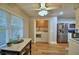 Convenient laundry area adjacent to kitchen featuring modern appliances and counter space at 2835 Wingfoot Ct, Winter Haven, FL 33884
