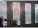 Sunroom with views of the outdoors, showcasing natural light and a tranquil atmosphere at 2835 Wingfoot Ct, Winter Haven, FL 33884