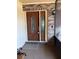 Welcoming entryway featuring a decorative front door and brick accents at 381 Troon Ct, Winter Haven, FL 33884