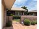 Charming single-story home with brick paved walkway and gated courtyard at 381 Troon Ct, Winter Haven, FL 33884