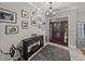 Welcoming foyer features stylish decor and a dark wood front door, creating a warm entrance at 3985 Mammoth Grove Rd, Lake Wales, FL 33898