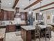 Modern kitchen with granite countertops, stainless steel appliances, and convenient center island seating at 3985 Mammoth Grove Rd, Lake Wales, FL 33898