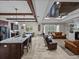 Spacious open-concept living space with granite island, recessed lighting, ceiling fan, and comfortable seating at 3985 Mammoth Grove Rd, Lake Wales, FL 33898