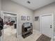 Functional mud room with storage shelf, coat rack and convenient access to the main house and exterior at 3985 Mammoth Grove Rd, Lake Wales, FL 33898