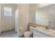 Bathroom with a walk-in shower, large mirror, and modern fixtures at 4338 Dinner Lake Blvd, Lake Wales, FL 33859
