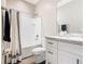 Bathroom featuring a white vanity, a sink, and a combination shower/tub at 481 Kensington View Dr, Winter Haven, FL 33880