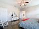 View of a spacious bedroom boasting neutral walls, plenty of natural light, and ceiling fan at 481 Kensington View Dr, Winter Haven, FL 33880