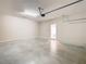 Spacious garage area, offering a clean and bright space with plenty of room for parking and storage at 481 Kensington View Dr, Winter Haven, FL 33880