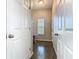 Hallway with a small table, a window, and a concrete floor at 481 Kensington View Dr, Winter Haven, FL 33880