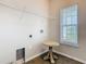 Clean laundry room with washer/dryer connections and a window at 481 Kensington View Dr, Winter Haven, FL 33880