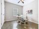 Bright office area with a large window, desk, and modern decor, ideal for remote work at 481 Kensington View Dr, Winter Haven, FL 33880