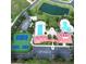 Aerial view of the tennis courts, pools, and clubhouse in community at 505 Adams View Ln, Auburndale, FL 33823