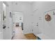 Hallway with access to a laundry room at 505 Adams View Ln, Auburndale, FL 33823