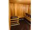Wood sauna with benches and grill at 505 Adams View Ln, Auburndale, FL 33823