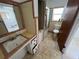 Bathroom featuring a vintage vanity, a tub and shower with sliding doors at 507 Avenue H Se, Winter Haven, FL 33880