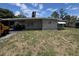 Charming single-story home with a covered carport and classic brick facade at 507 Avenue H Se, Winter Haven, FL 33880