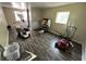 Room filled with lawn care equipment and tools at 507 Avenue H Se, Winter Haven, FL 33880
