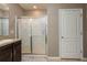 Bathroom showcasing a glass-enclosed shower and vanity with modern fixtures at 536 Squires Grove Dr, Winter Haven, FL 33880