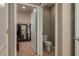 View into a bathroom area and a closet showing the layout and available storage at 536 Squires Grove Dr, Winter Haven, FL 33880