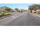 Gated community entrance featuring stone pillars and black iron gates for enhanced security and privacy at 6528 Sedgeford Dr, Lakeland, FL 33811