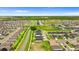 Aerial view of a residential area featuring neatly organized homes, green spaces, and picturesque landscaping at 716 Vittorio Dr, Winter Haven, FL 33884