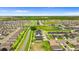Aerial view of a residential area featuring neatly organized homes, green spaces, and picturesque landscaping at 716 Vittorio Dr, Winter Haven, FL 33884