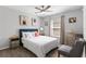 Comfortable bedroom features stylish decor, ceiling fan, and ample natural light at 716 Vittorio Dr, Winter Haven, FL 33884