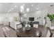 Open layout with dining leading into living area and kitchen, great for entertaining at 716 Vittorio Dr, Winter Haven, FL 33884