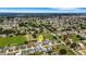 Aerial view of a neighborhood with lush greenery, showcasing the property's location and surroundings at 7929 Ashley Pointe Dr, Lakeland, FL 33810