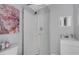 Modern bathroom featuring a glass shower and a stylish vanity with a mirror at 7929 Ashley Pointe Dr, Lakeland, FL 33810