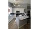 Well-designed kitchen with a granite island, stainless steel appliances, and ample cabinet space at 7929 Ashley Pointe Dr, Lakeland, FL 33810