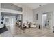 Cozy living room features wood-look tile flooring and neutral tones at 7929 Ashley Pointe Dr, Lakeland, FL 33810