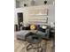 Comfortable living room with plush seating, decorative pillows, and stylish wall decor at 7929 Ashley Pointe Dr, Lakeland, FL 33810