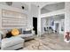Bright living room with vaulted ceiling, stylish decor and wood-look tile flooring at 7929 Ashley Pointe Dr, Lakeland, FL 33810