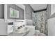 Bathroom offering vanity, toilet and shower/tub, ensuring a complete and functional space at 1019 Milner E Dr, Lakeland, FL 33810