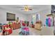 Bright, airy room featuring a table and chair set and dressers, perfect for studying, crafting, or just unwinding at 1019 Milner E Dr, Lakeland, FL 33810