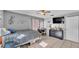 Cozy bedroom featuring a ceiling fan, closet space, and a soothing ambiance for restful nights at 1019 Milner E Dr, Lakeland, FL 33810