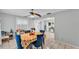 Bright dining area with tile floors, ceiling fan, and a table set for four, perfect for Gathering meals at 1019 Milner E Dr, Lakeland, FL 33810